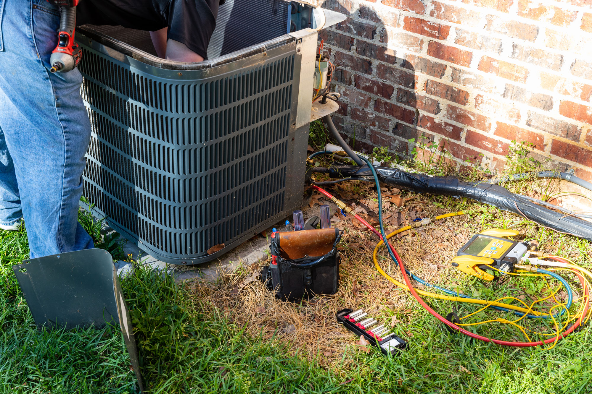 Maintenance being done on a AC unit