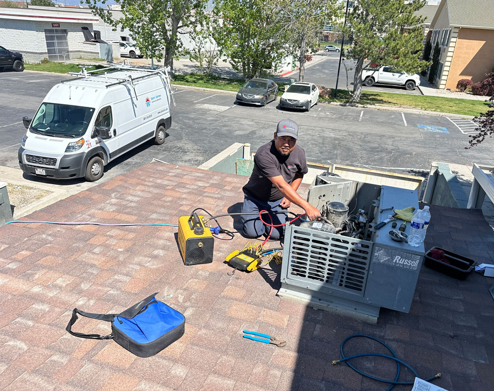 Sami James HVAC Technician repair a HVAC System